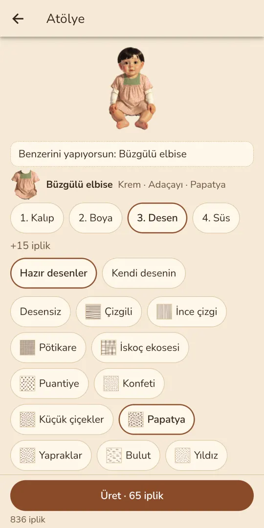 Patik atölyesi: üstte desenli elbise giymiş bebek önizlemesi, Kalıp, Boya, Desen ve Süs adımları, desen çipleri ve iplik bedelini gösteren Üret düğmesi