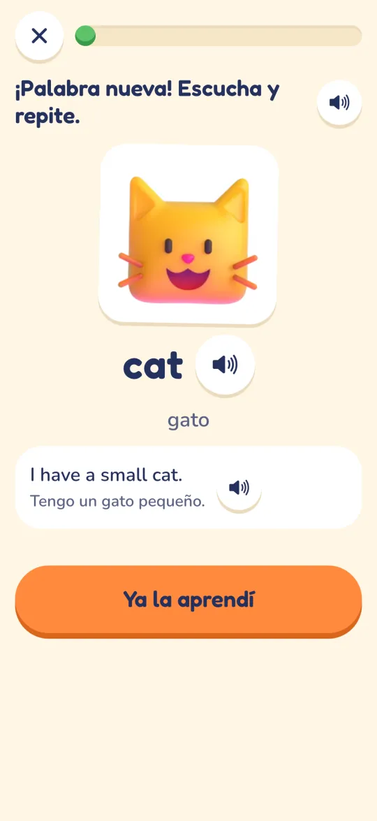 New word screen: a cat sticker, the English word “cat” with a speaker button, its translation and the example sentence “I have a small cat.”