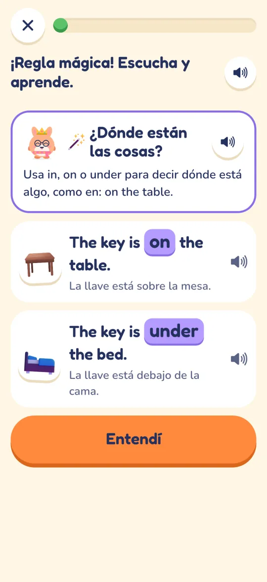 Magic rule card about where things are: in, on and under, with the examples “The key is on the table” and “The key is under the bed”
